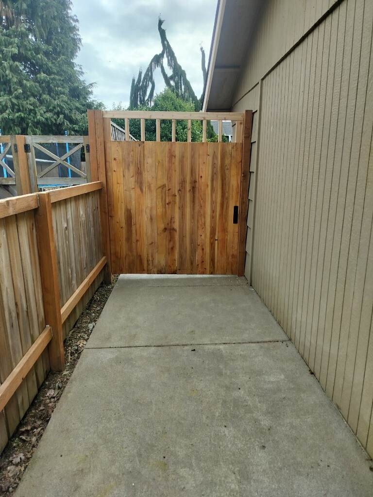 Cedar side yard gate with a wire mesh top panel